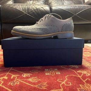 Grey and brown shoes.